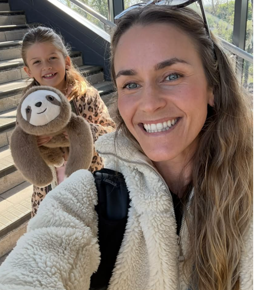 Frances, Maya and her sloth on the stairs